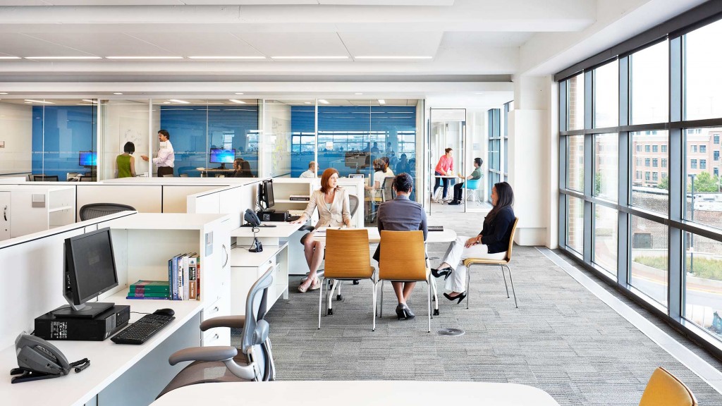 A group of people in an office.