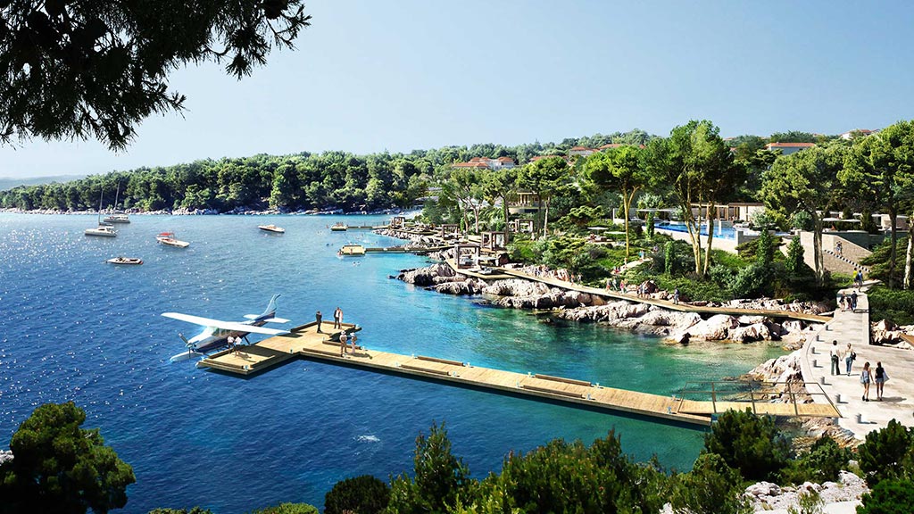A body of water with boats and people walking on it.