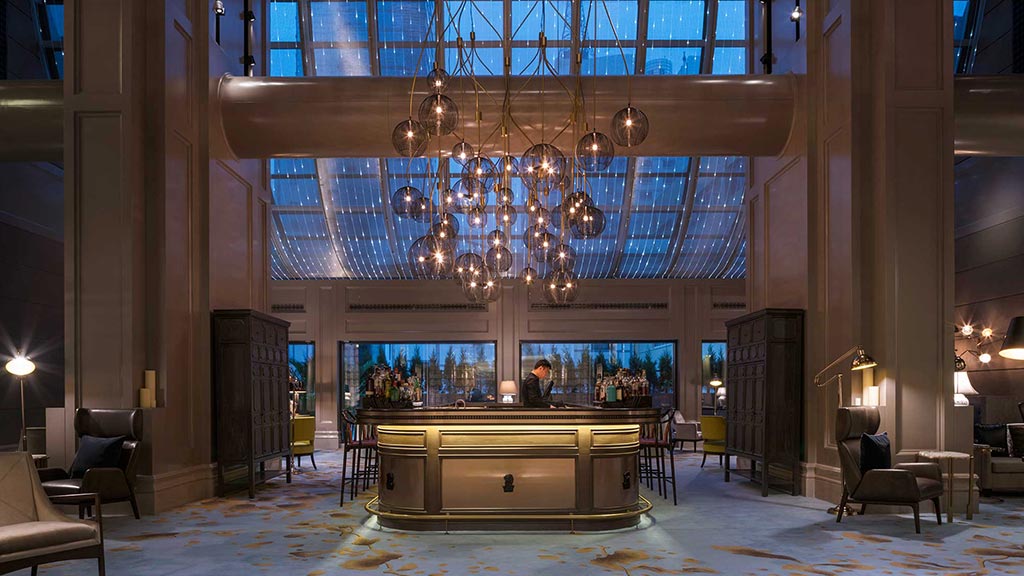 A large room with a large chandelier and a large window.