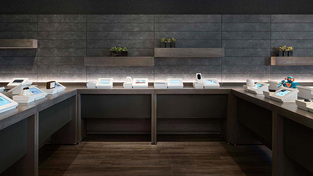 A room with desks and shelves.