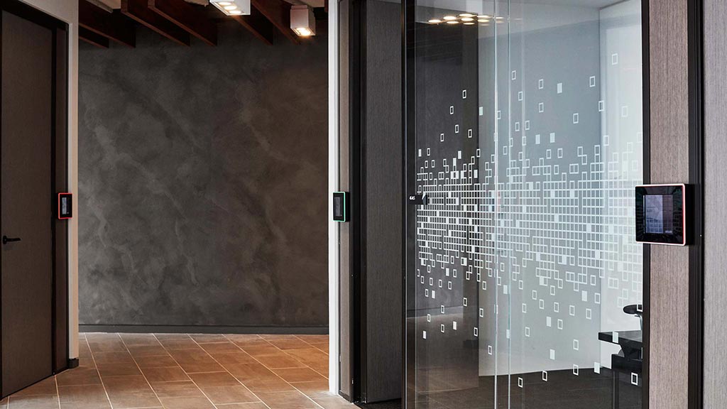 A shower with glass doors.