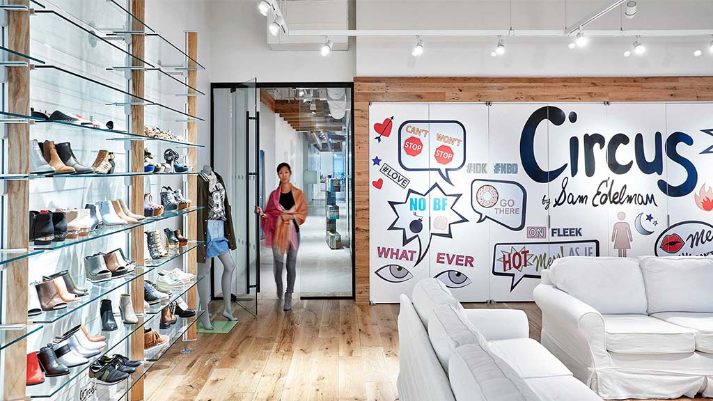 A person standing in a shoe store.