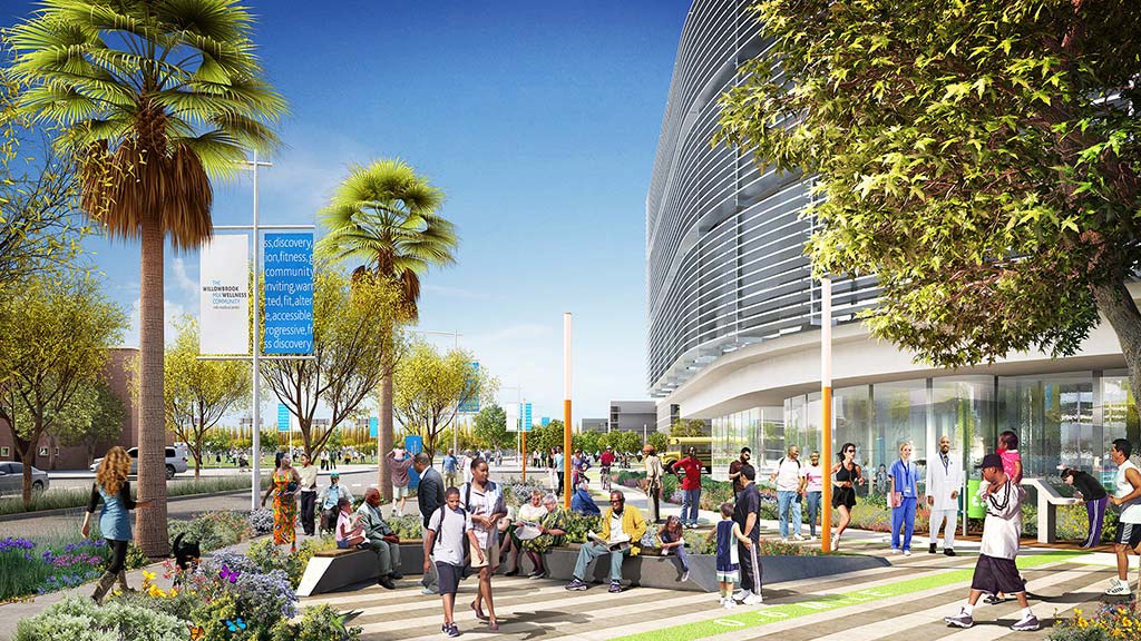 A group of people walking around a building.