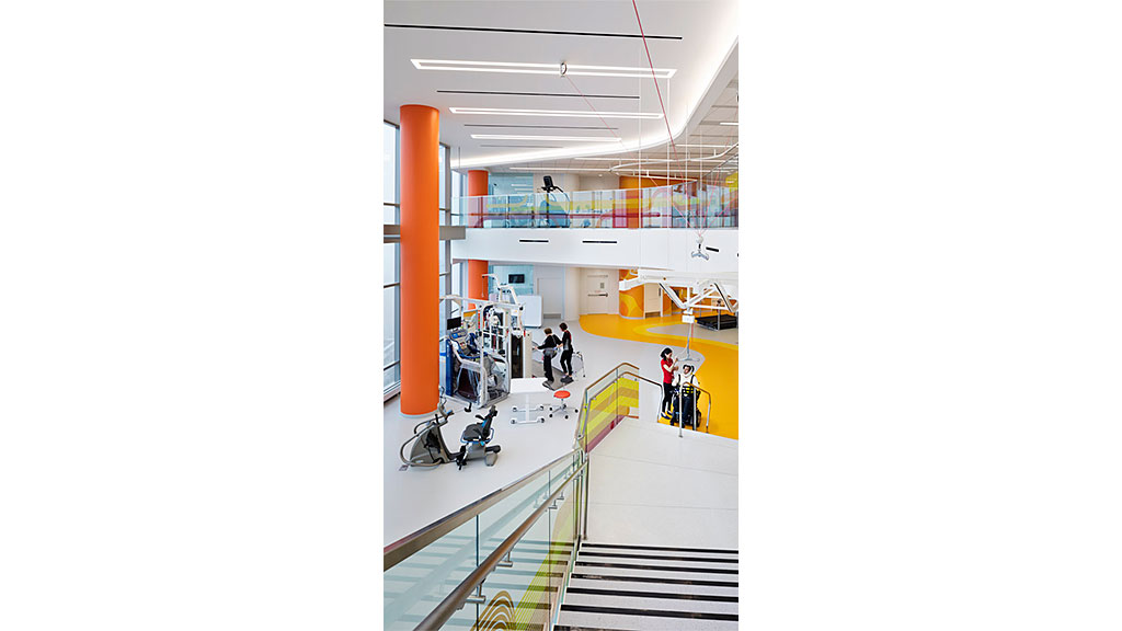 People standing in a large room.