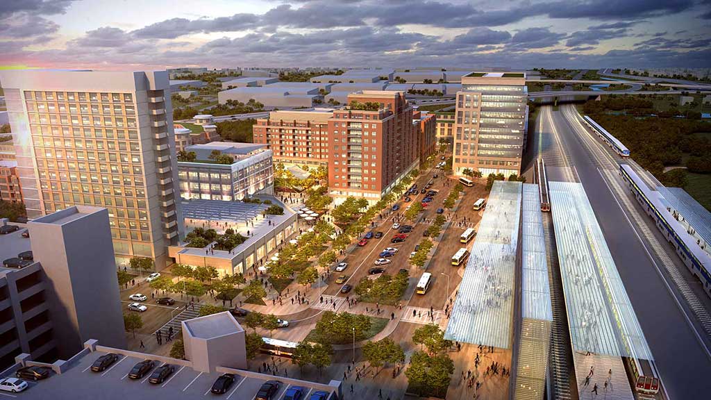 A city with a freeway and buildings.