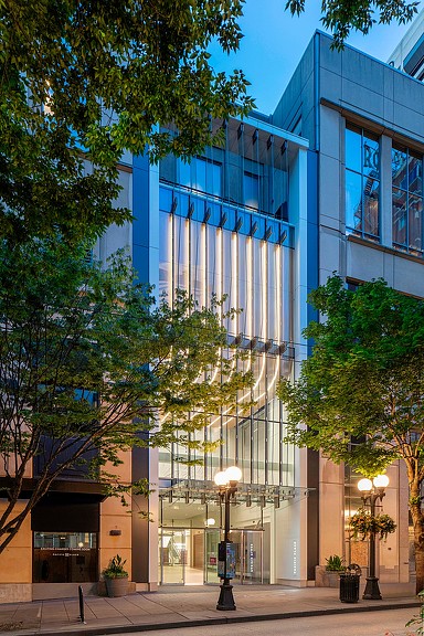 A building with trees in front of it.