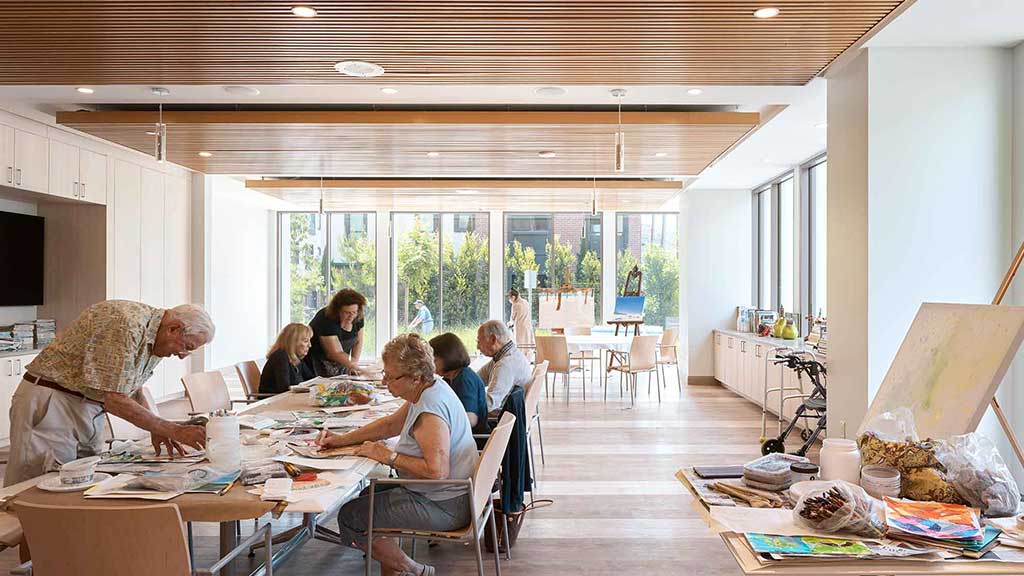 A group of people sitting at a table.