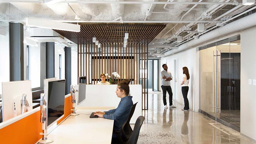 A group of people in an office.