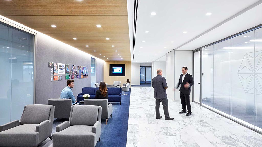 A group of people in a room.