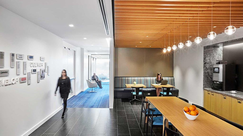 A person walking in a large room.