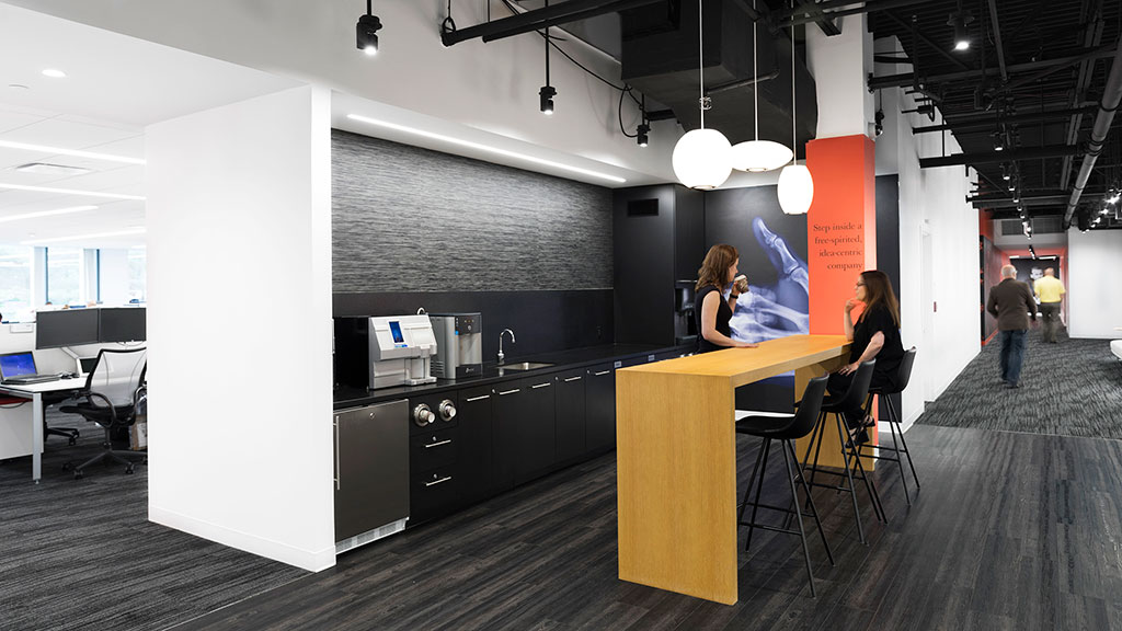 A group of people in an office.