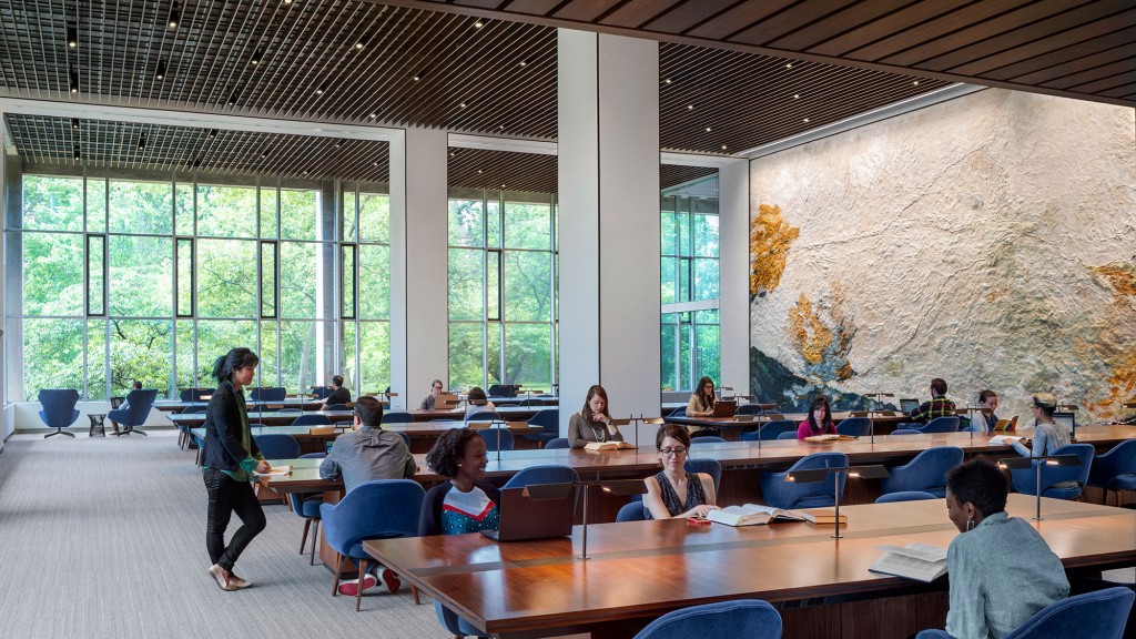 A group of people sitting at tables.
