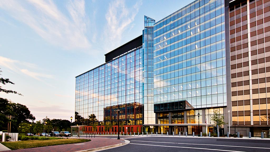 A large building with glass windows.