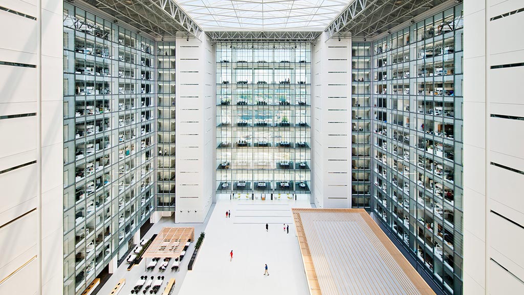 A room with shelves of computer servers.