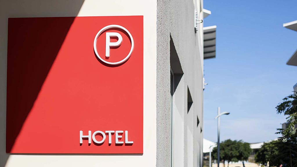 A red sign on a building.