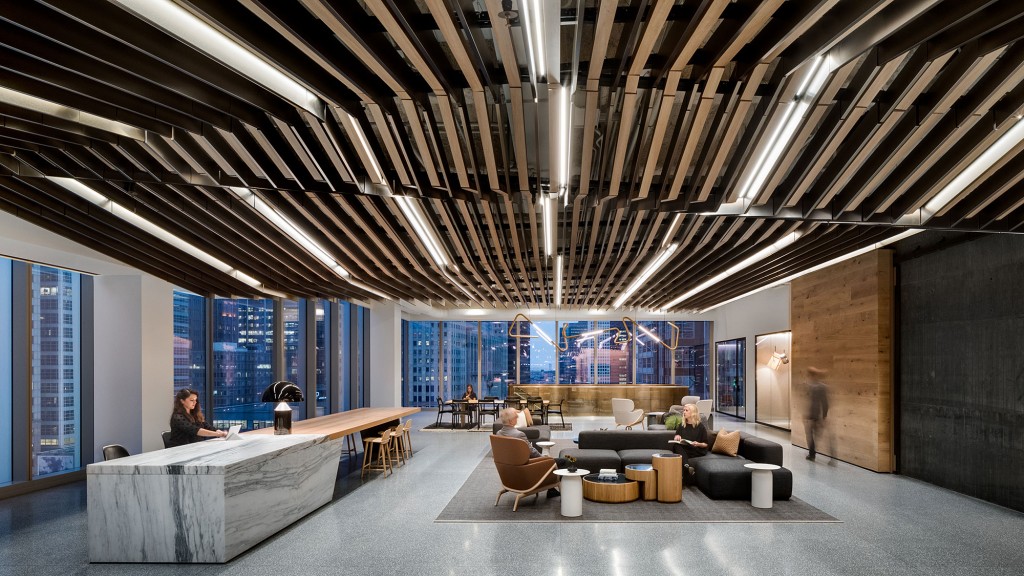 A room with a table and chairs.