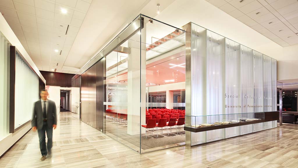 A person walking in a large room.