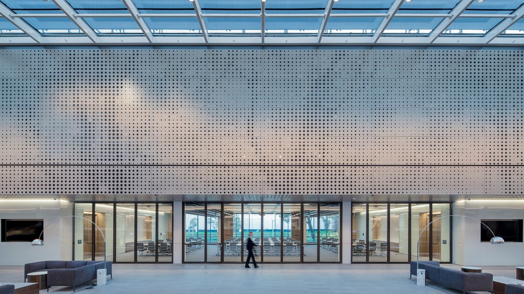 A person walking in a large building.