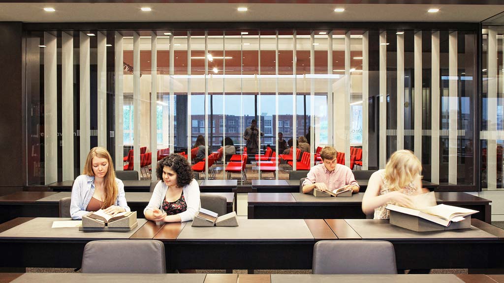 A group of people sitting at a table.