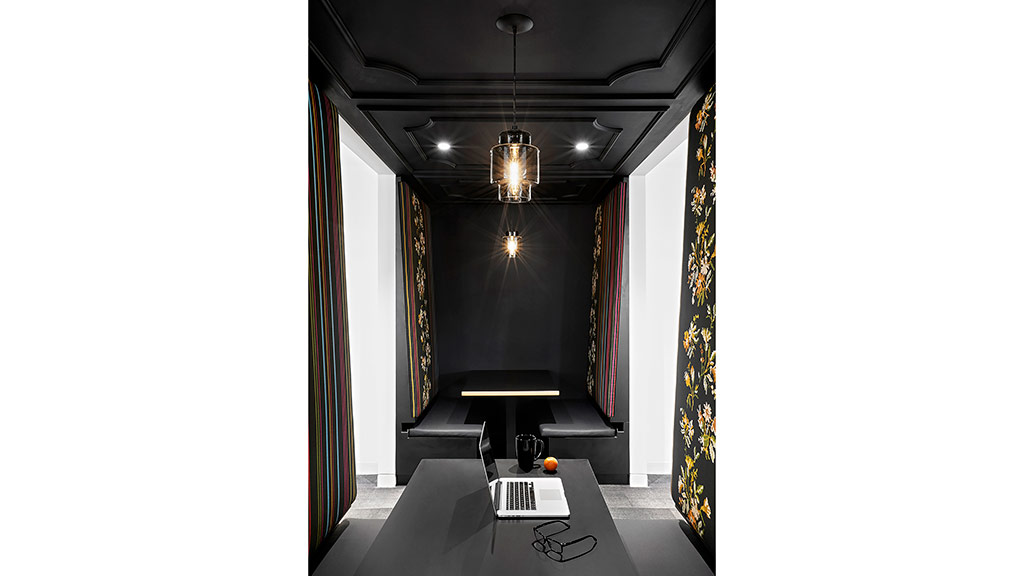 A laptop on a table.