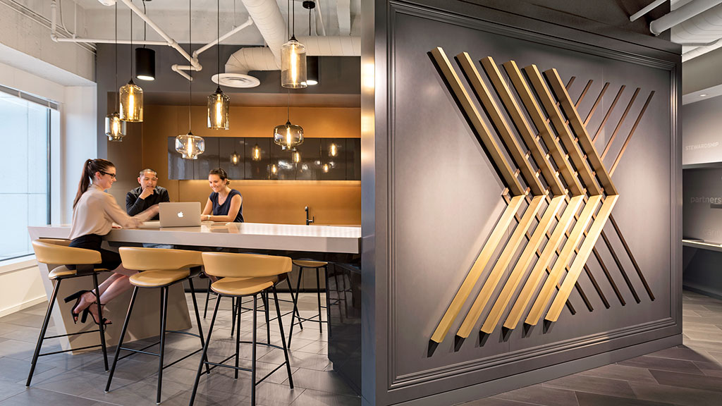 A couple of women sitting at a table in a restaurant.