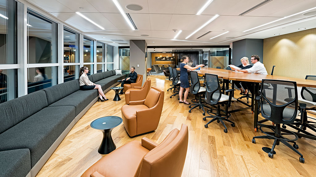 A group of people in an office.