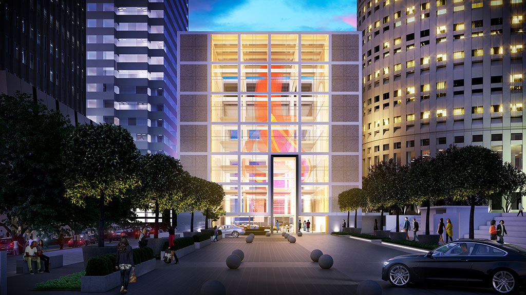 A street with cars and buildings around it.