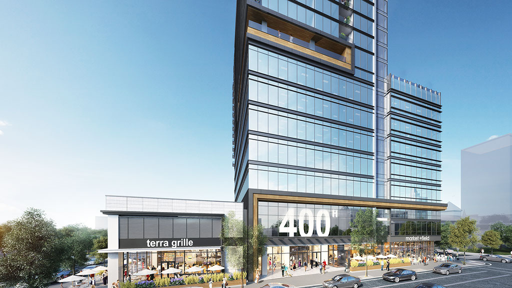 A large building with a parking lot.