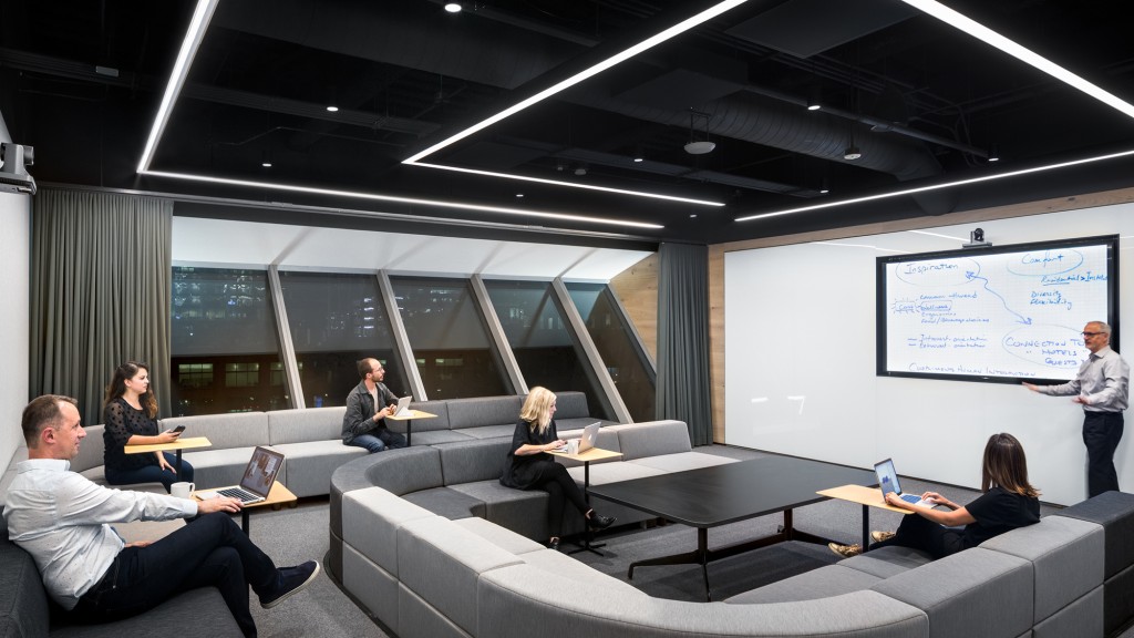 A group of people in a meeting.