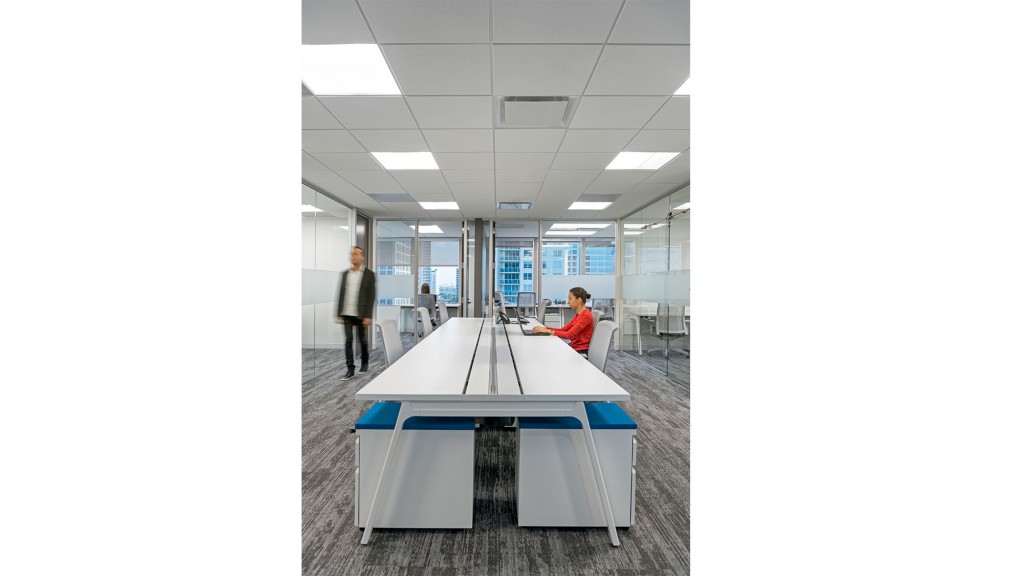 A man and a woman in an office.