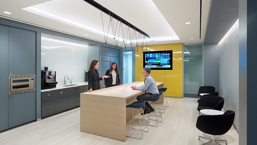 A group of people in an office.