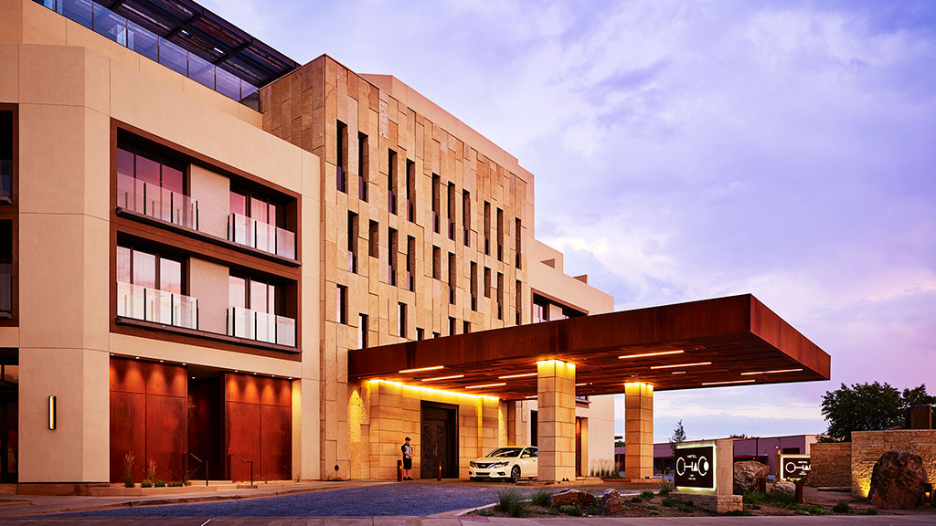 A building with a parking lot.