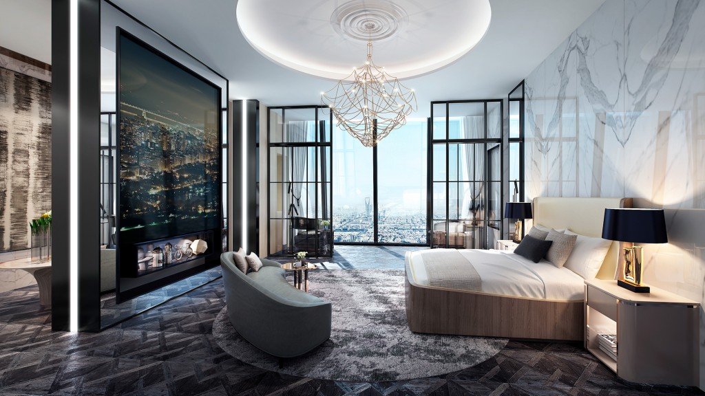 A bedroom with a large glass window.