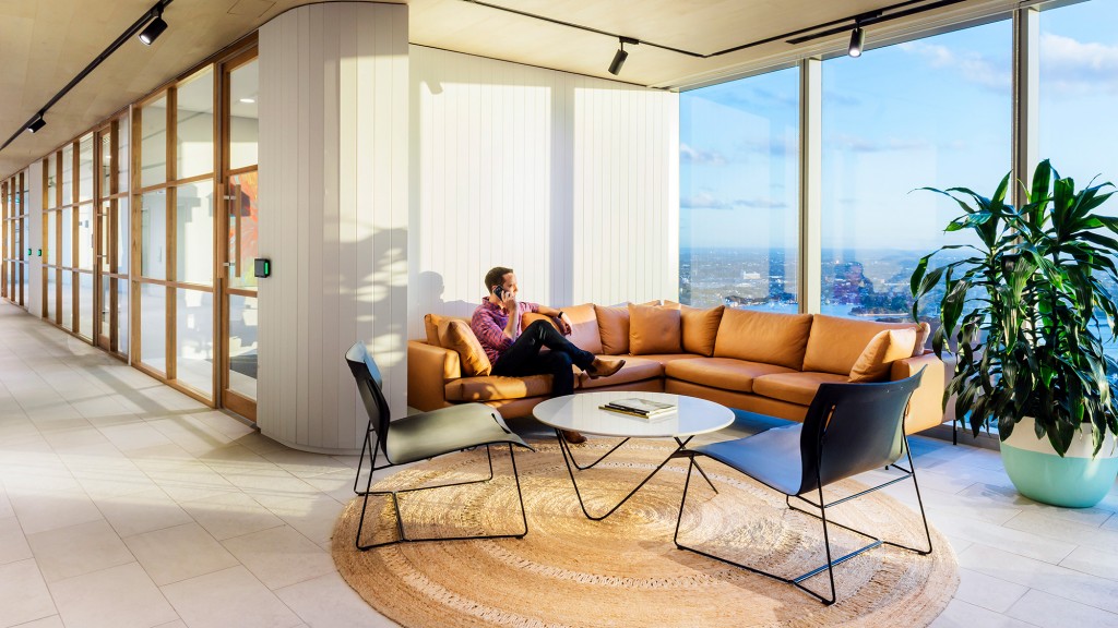 A person sitting on a couch.