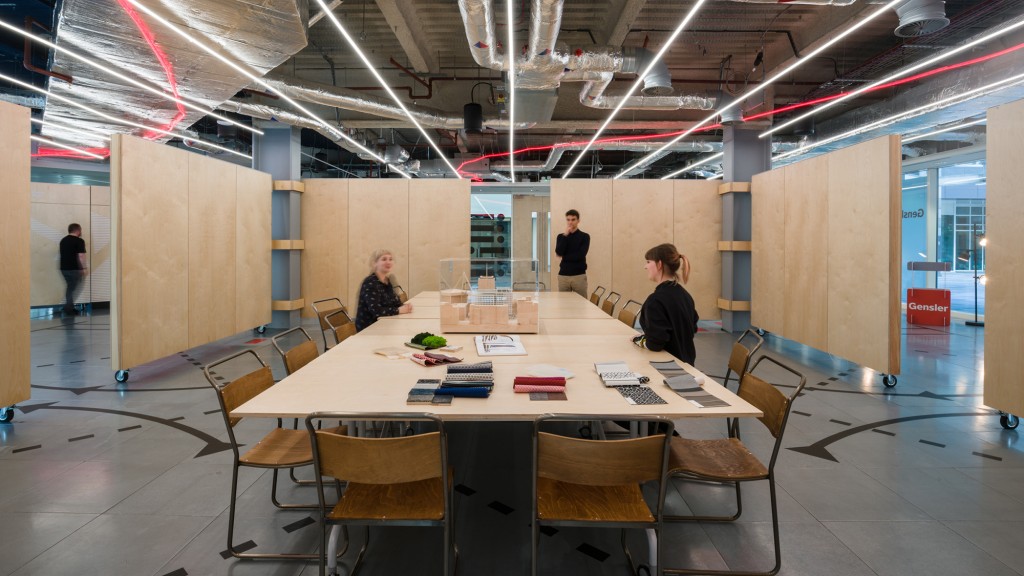 A few people in a conference room.