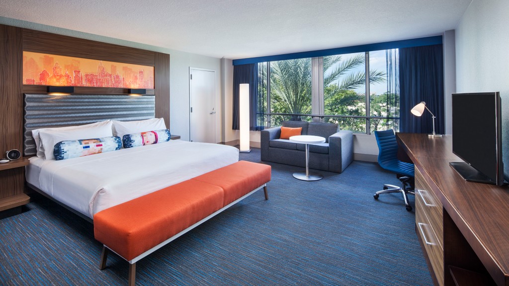 A bedroom with a large bed.