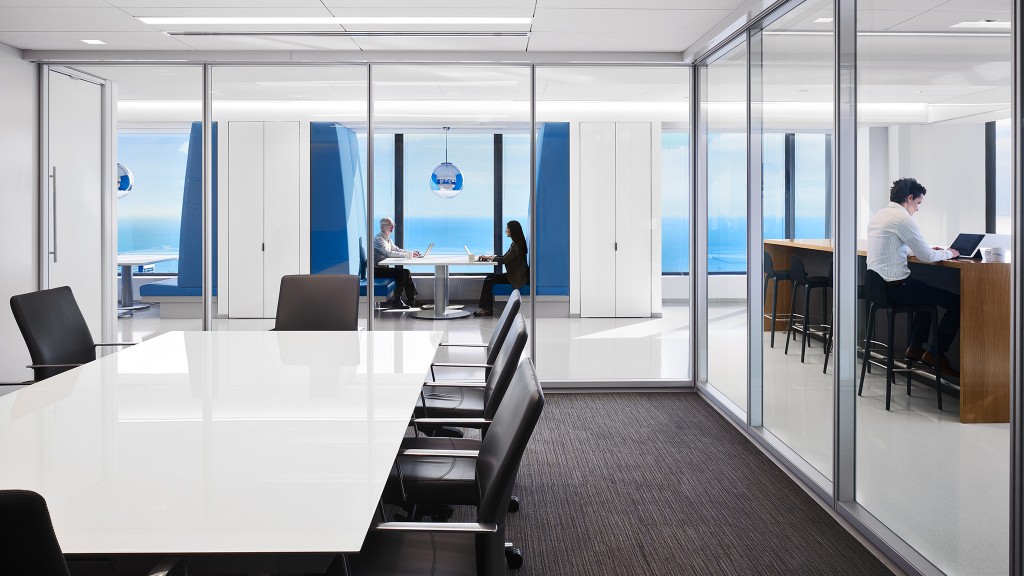 A few people working in an office.