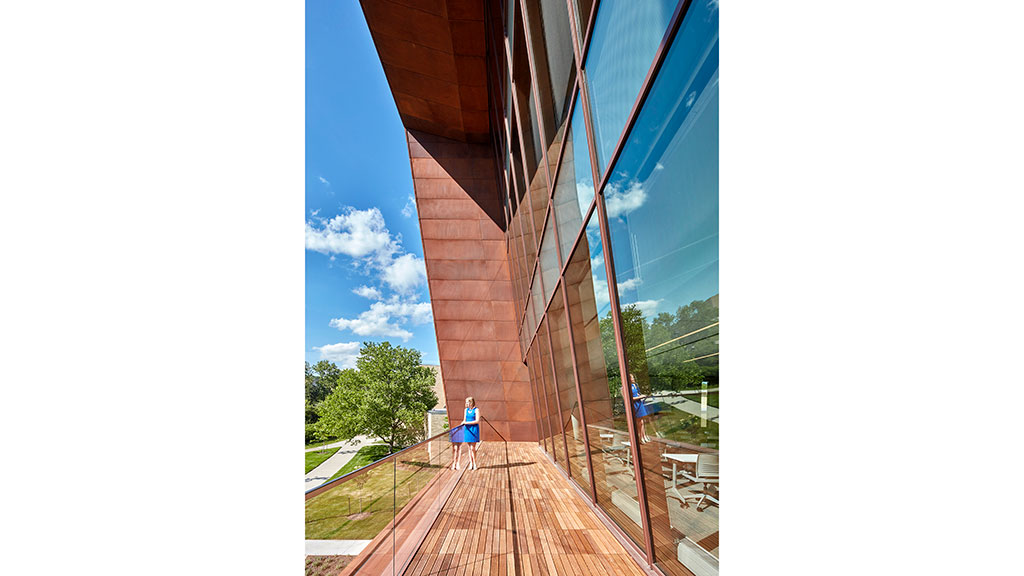 A person standing on a deck.