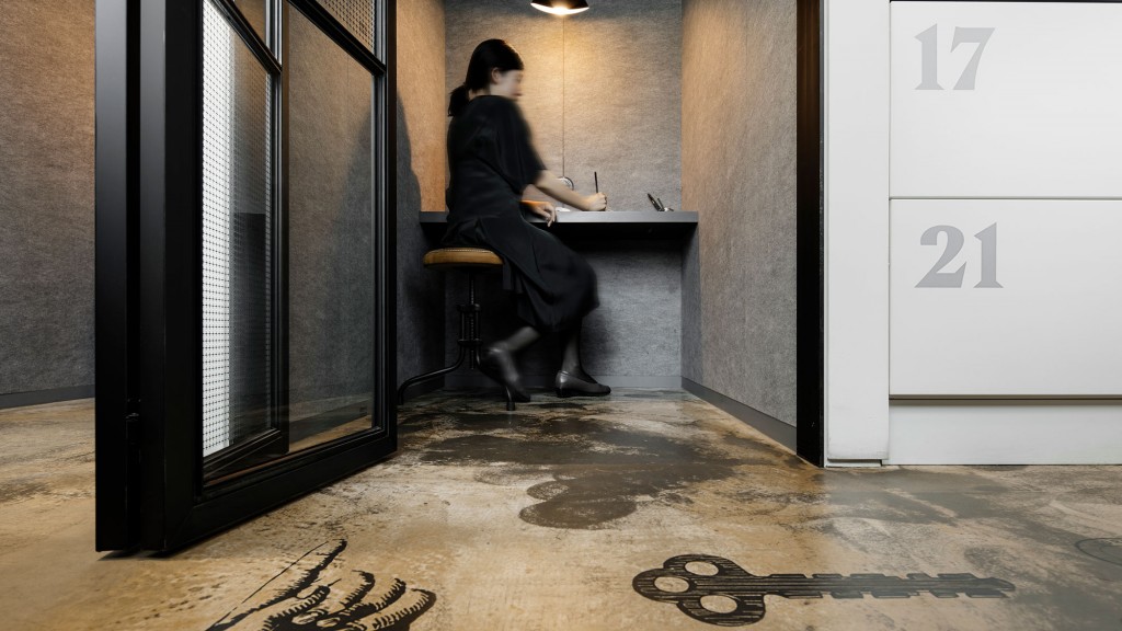A man sitting at a desk.