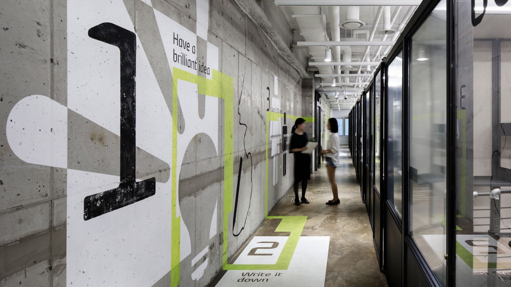 People standing in a hallway.