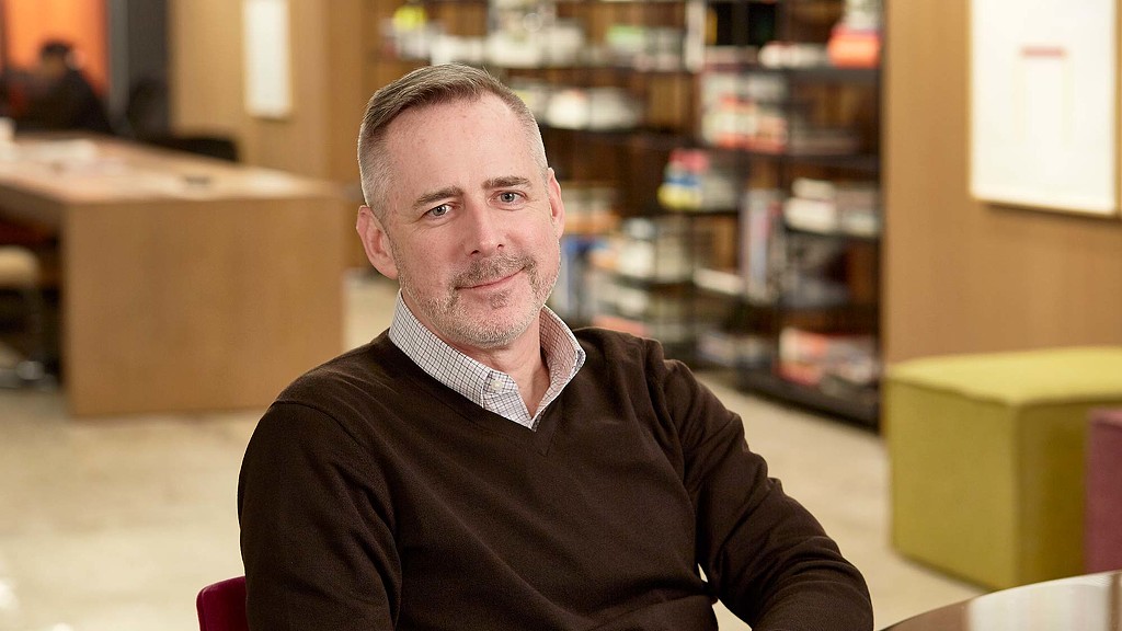 A man sitting in a chair.