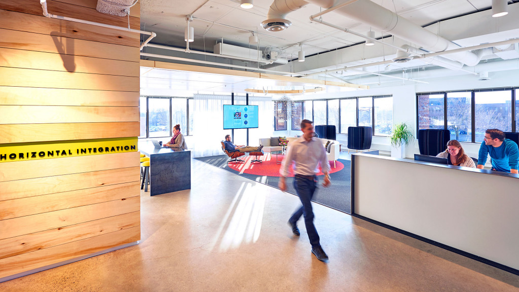 A man walking in a room.
