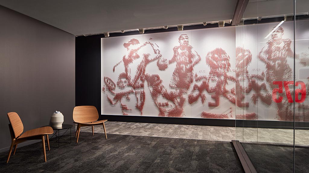 A wall with a painting on it.