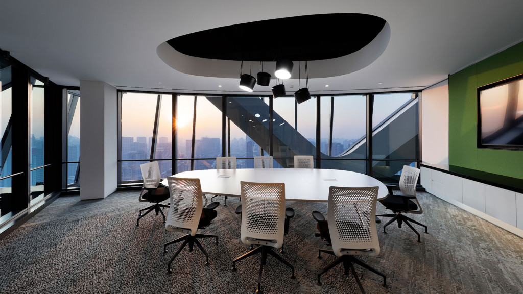 A room with a table and chairs.