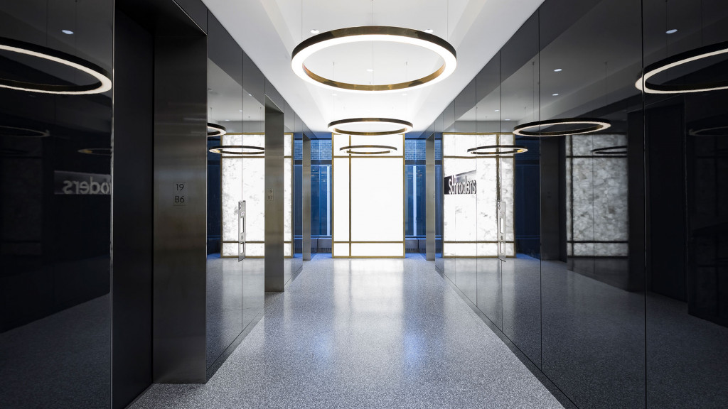 A hallway with blue doors.