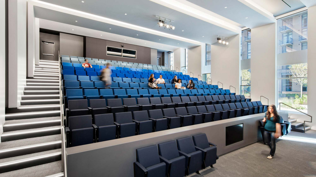 A group of people sitting in chairs.