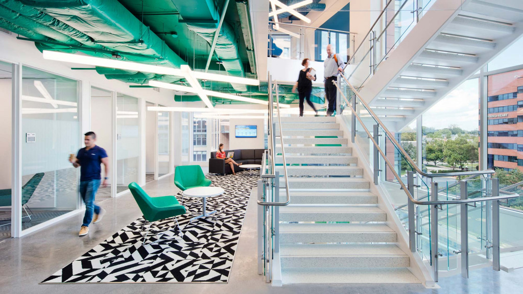 People walking up a flight of stairs.