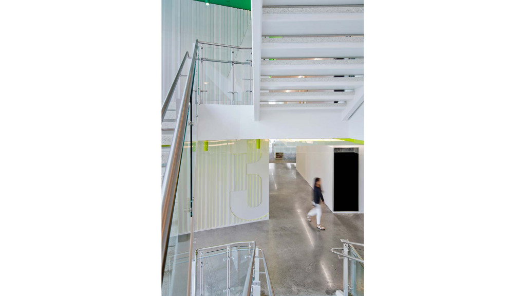 A person walking in a large room.