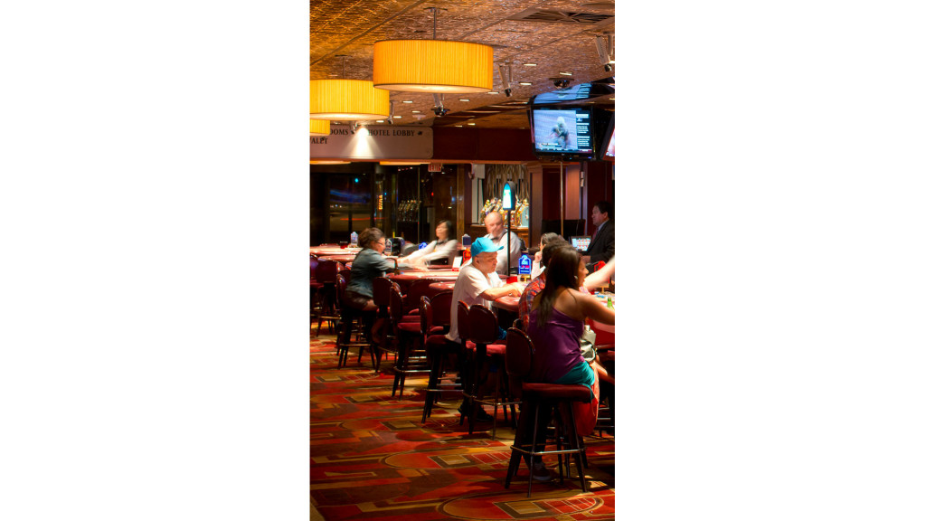 A group of people sitting at tables.