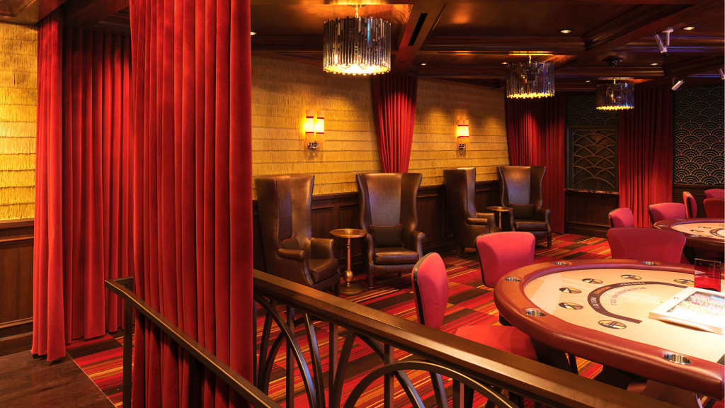 A room with tables and chairs.